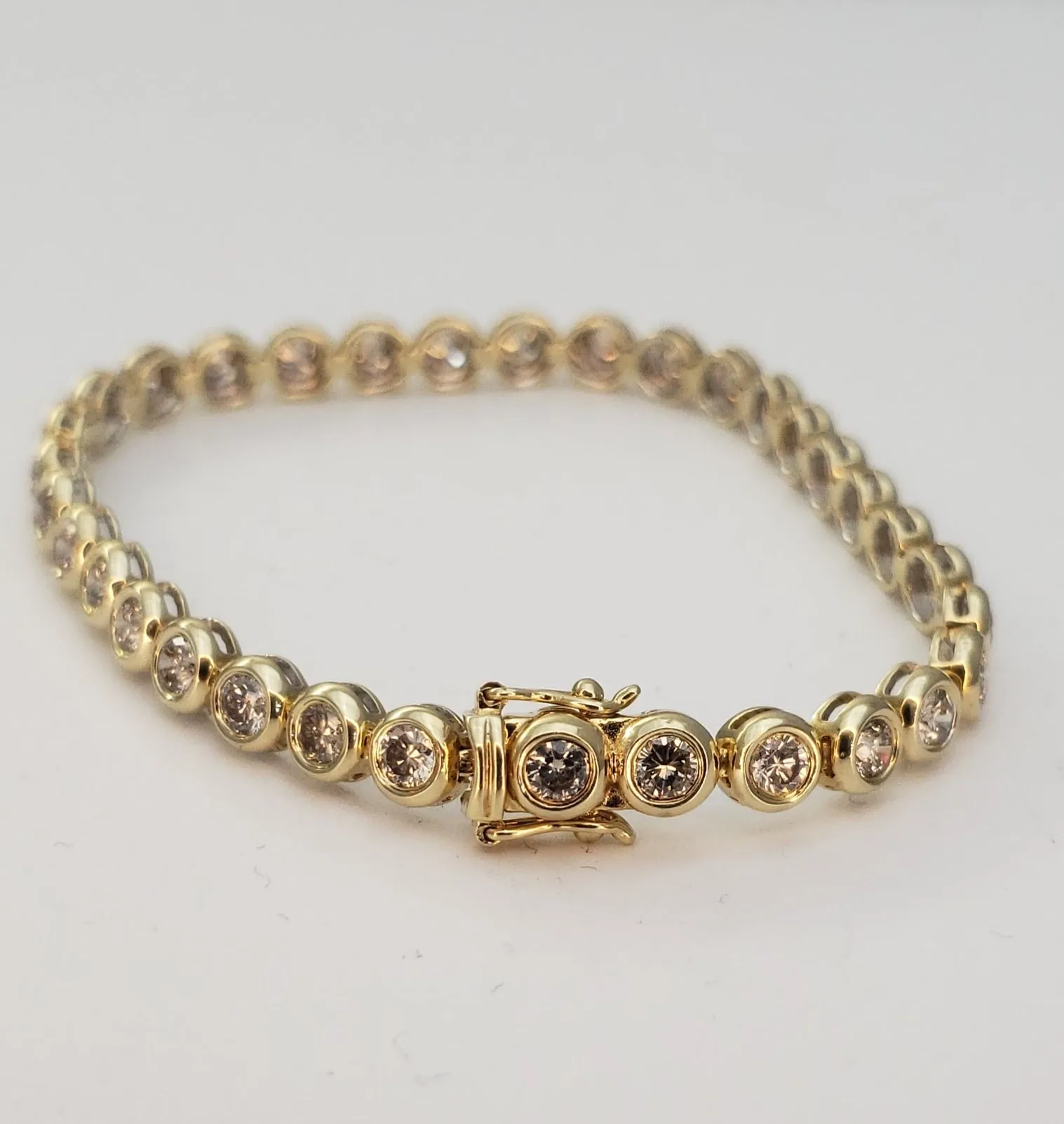 5 Carats Total Weight Diamond Bezel Set 14k Yellow Gold Tennis Bracelet