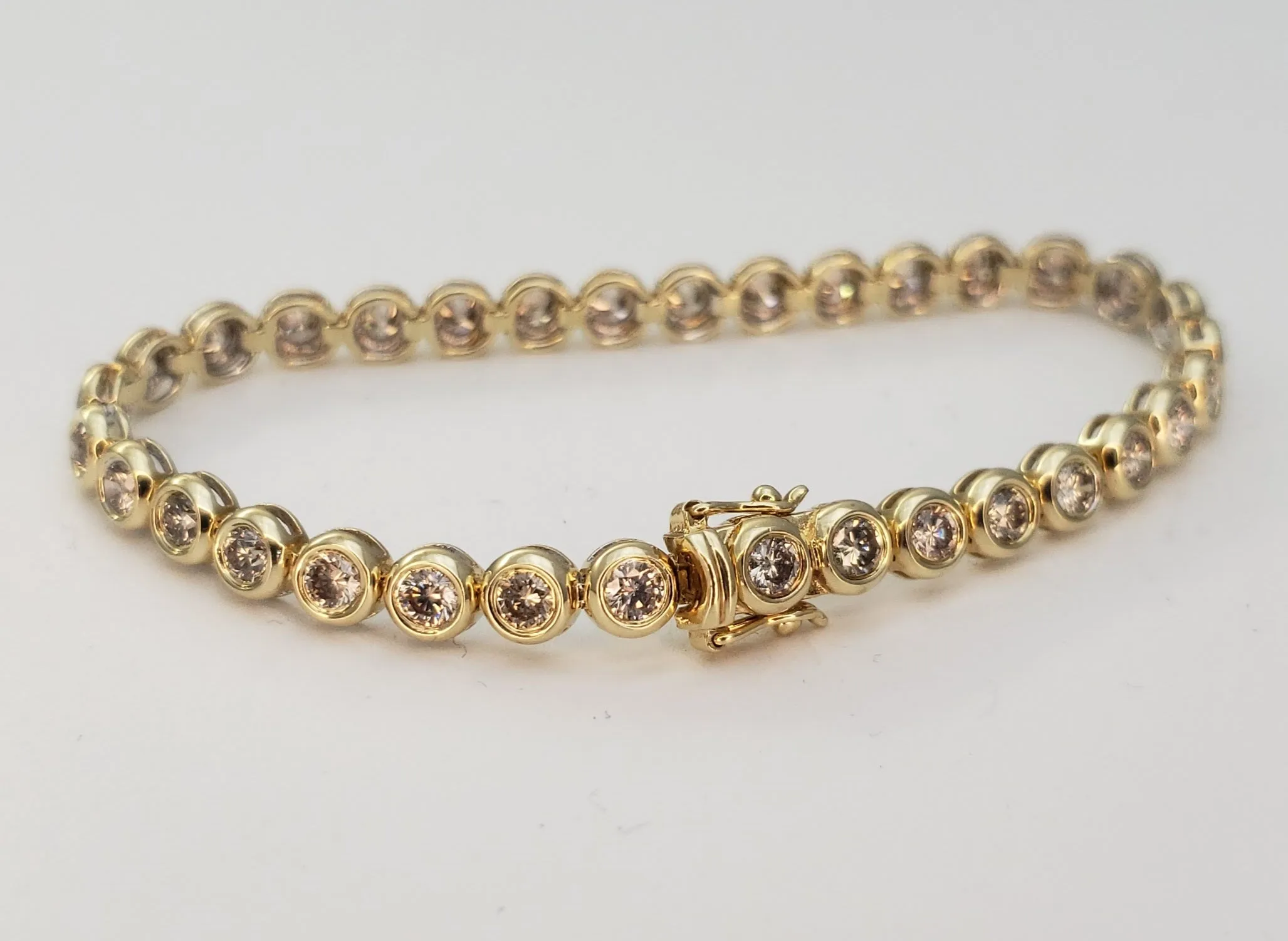 5 Carats Total Weight Diamond Bezel Set 14k Yellow Gold Tennis Bracelet